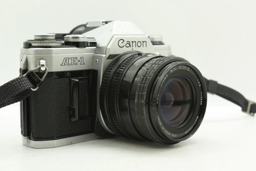 Canon 35mm film slr with - ae-1,